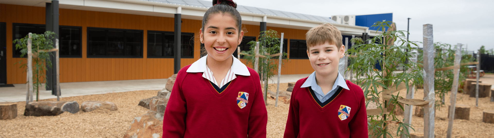 smiling uniformed students